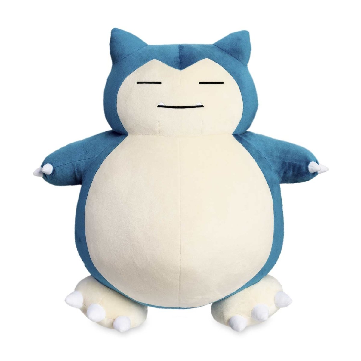 A large, sleeping Snorlax plush